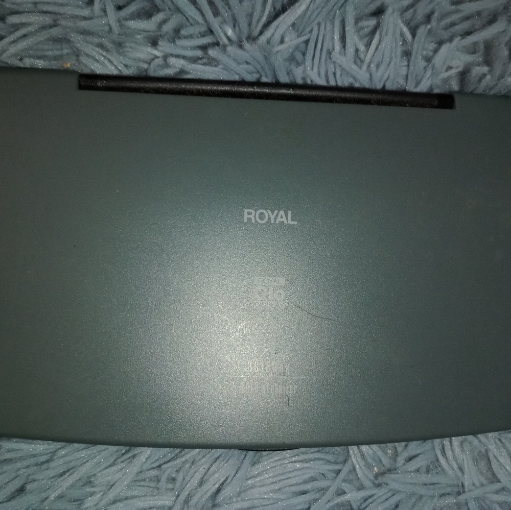 Royal RG180 handheld organizer. Pc compatible. Spell check, calculator, etc..